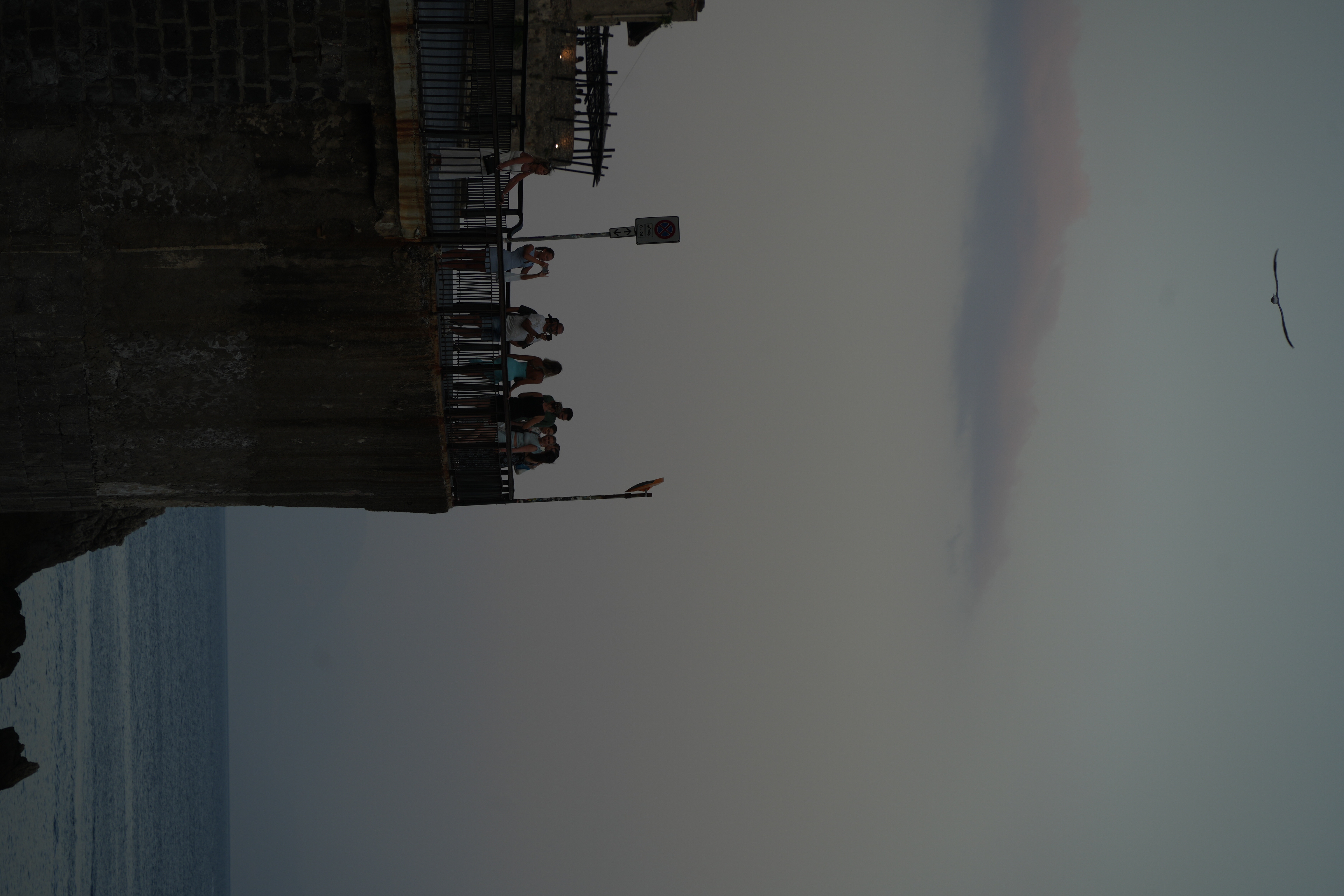 A group of people standing on / A group of people standing on